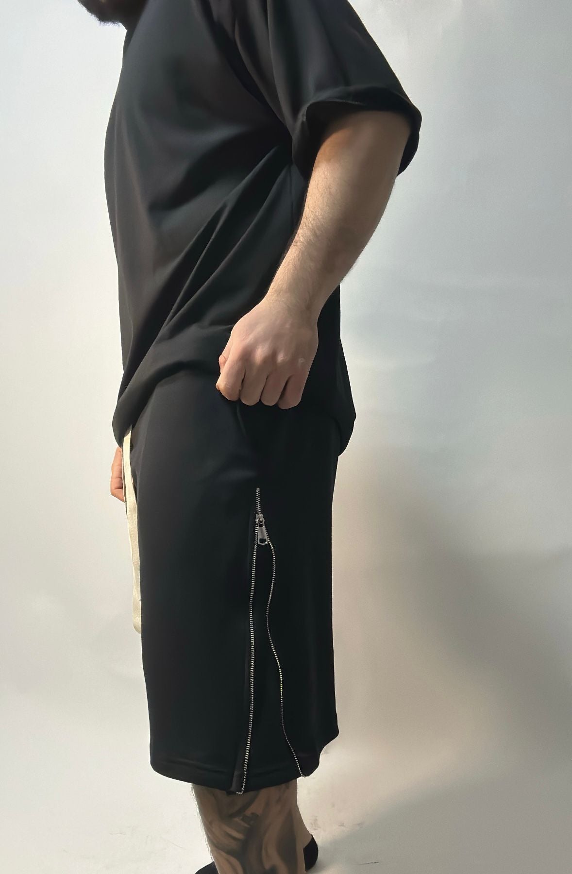 SHORTS ZIP IN TUTA